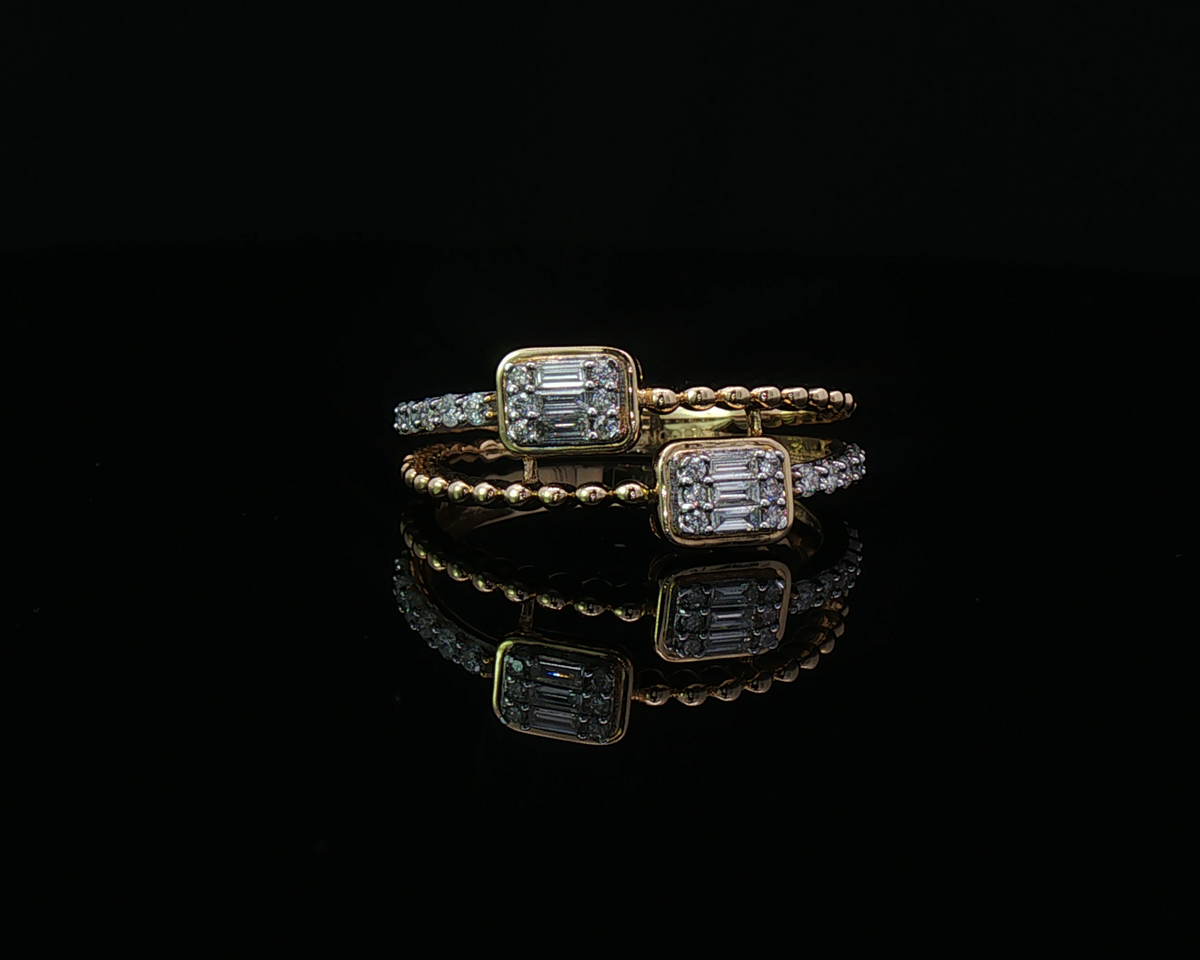 Double emerald diamond ring