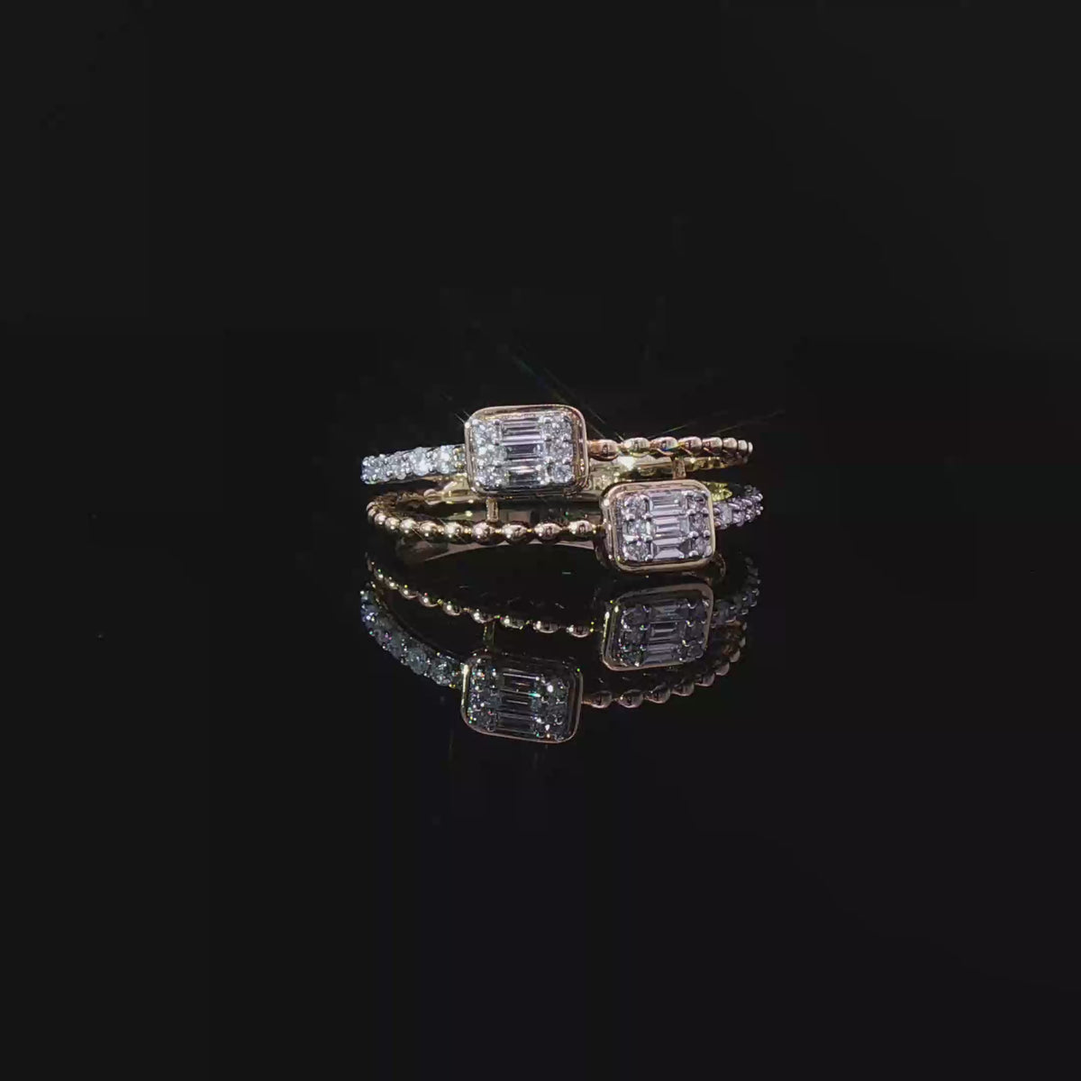 Double emerald diamond ring